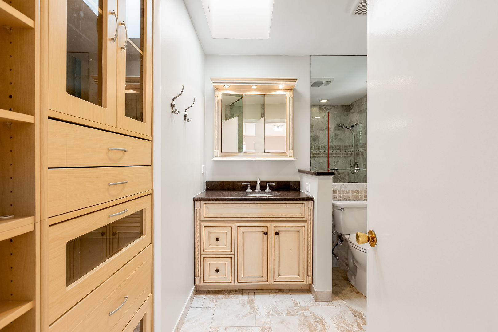 3528 Riverside Drive Wilmette, IL 60091 - Photo 15 of 33 a kitchen with stainless steel appliances granite countertop cabinets and a window