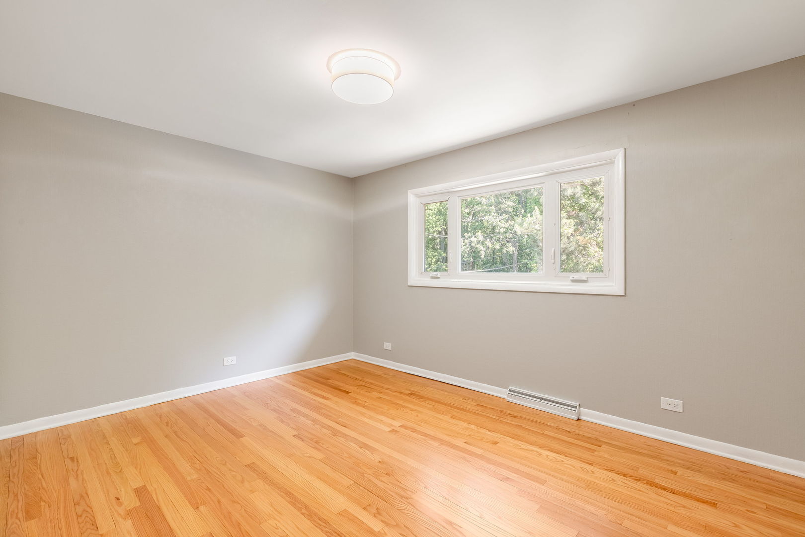 3528 Riverside Drive Wilmette, IL 60091 - Photo 17 of 33 a view of empty room with wooden floor