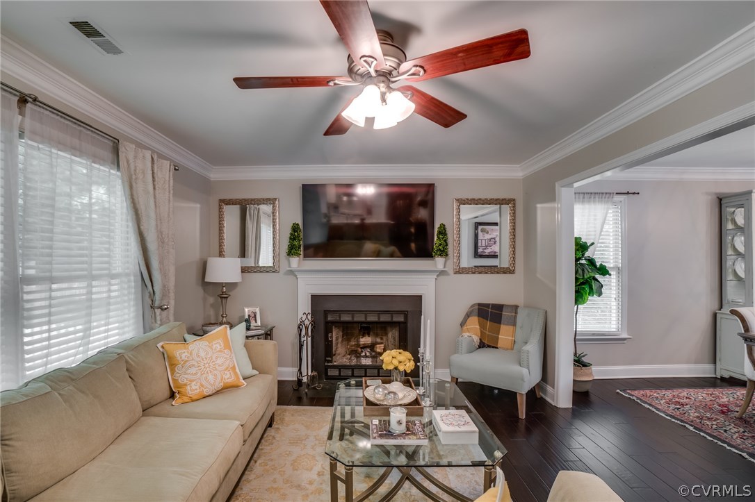 15209 Windy Ridge Road Midlothian, VA 23112 - Photo 12 of 40 a living room with furniture and a fireplace