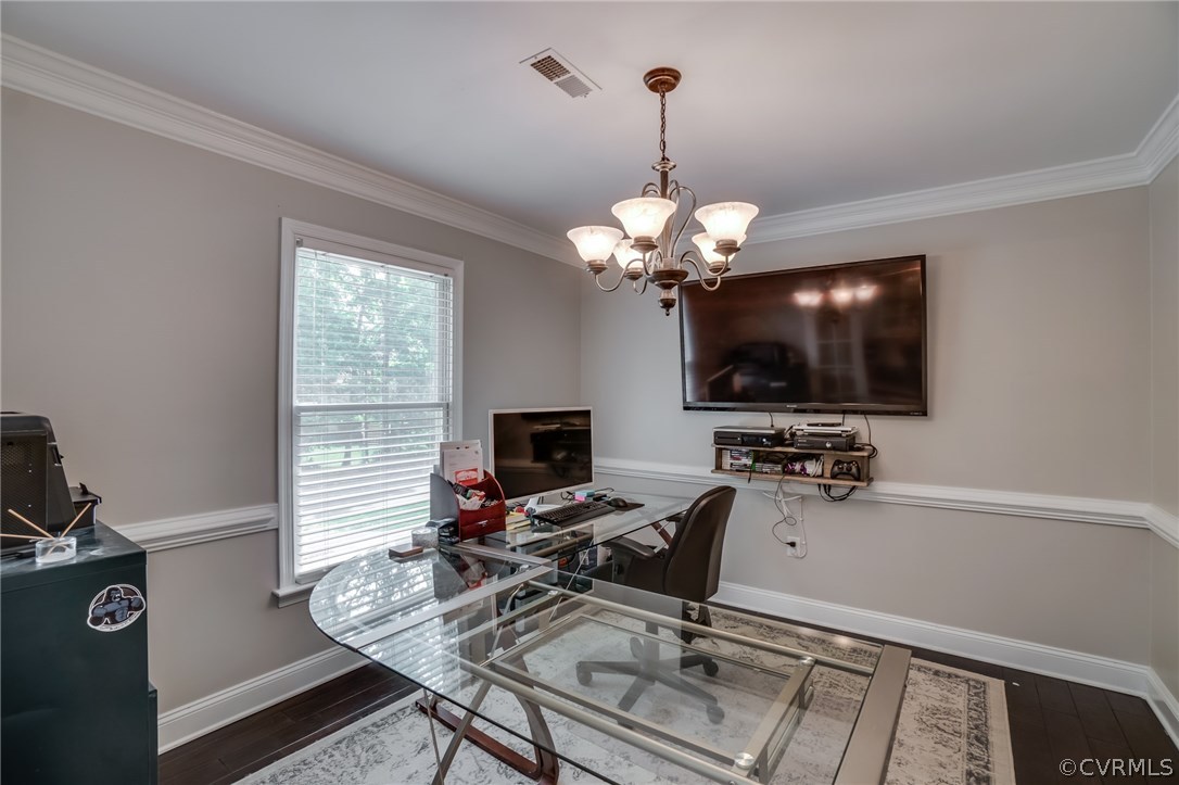 15209 Windy Ridge Road Midlothian, VA 23112 - Photo 21 of 40 a view of a workspace with furniture and a flat screen tv