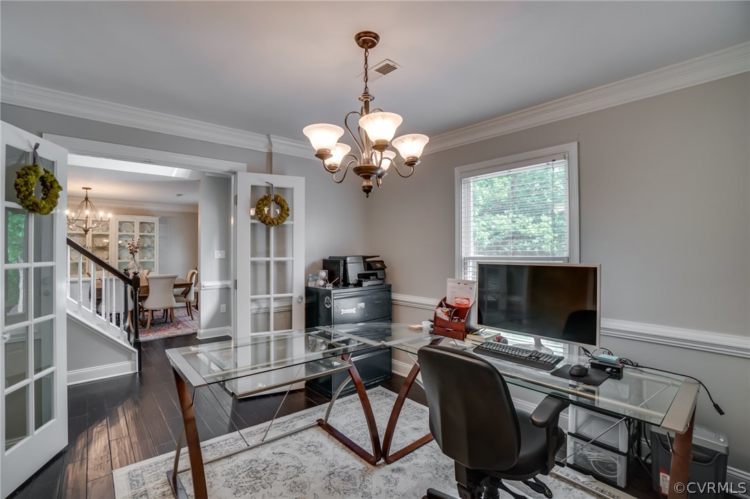 15209 Windy Ridge Road Midlothian, VA 23112 - Photo 22 of 40 a view of a workspace with furniture and a chandelier