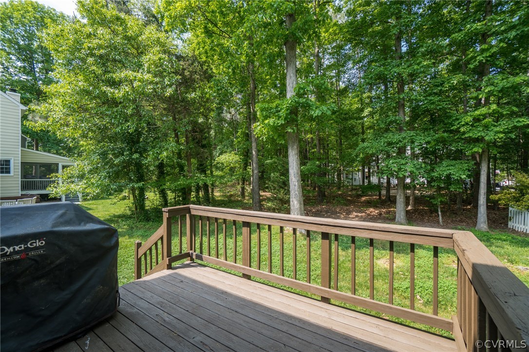 15209 Windy Ridge Road Midlothian, VA 23112 - Photo 36 of 40 a balcony with wooden floor and outdoor seating