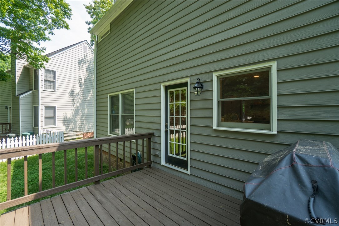 15209 Windy Ridge Road Midlothian, VA 23112 - Photo 37 of 40 a view of a house with a large window