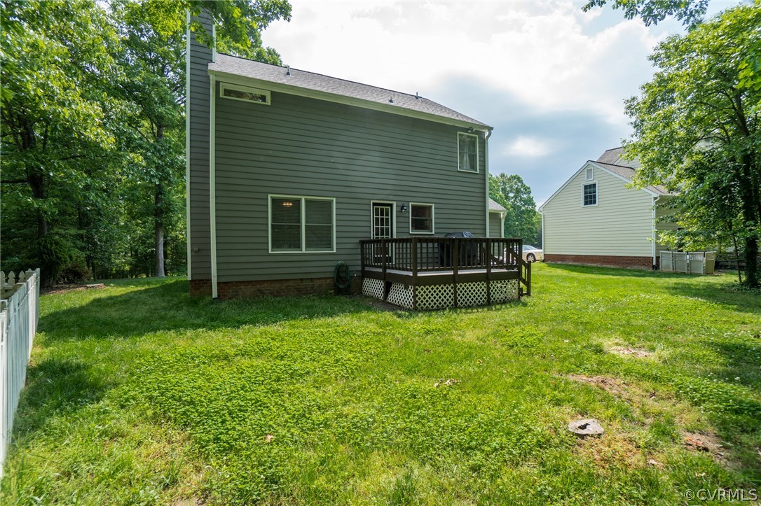 15209 Windy Ridge Road Midlothian, VA 23112 - Photo 38 of 40 a view of a house with backyard and sitting area