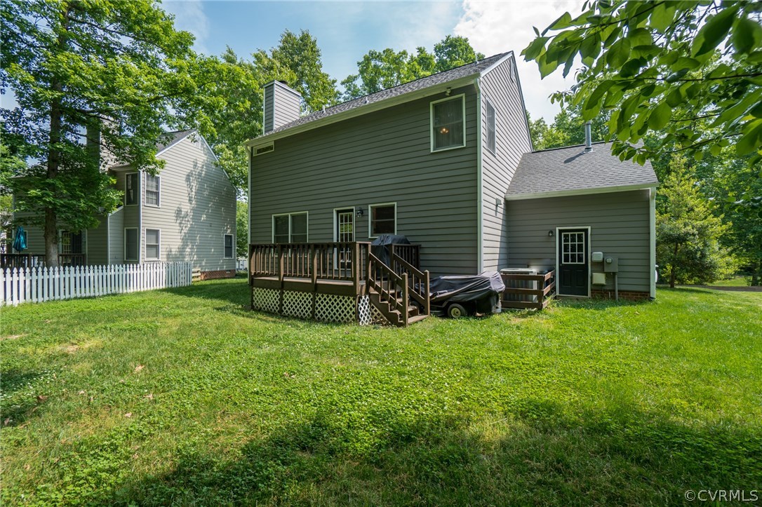 15209 Windy Ridge Road Midlothian, VA 23112 - Photo 40 of 40 a view of a house with backyard and a tree