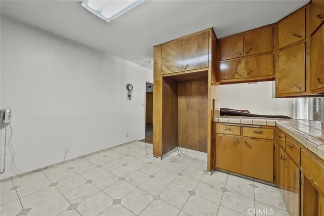 a view of cabinets and wooden floor