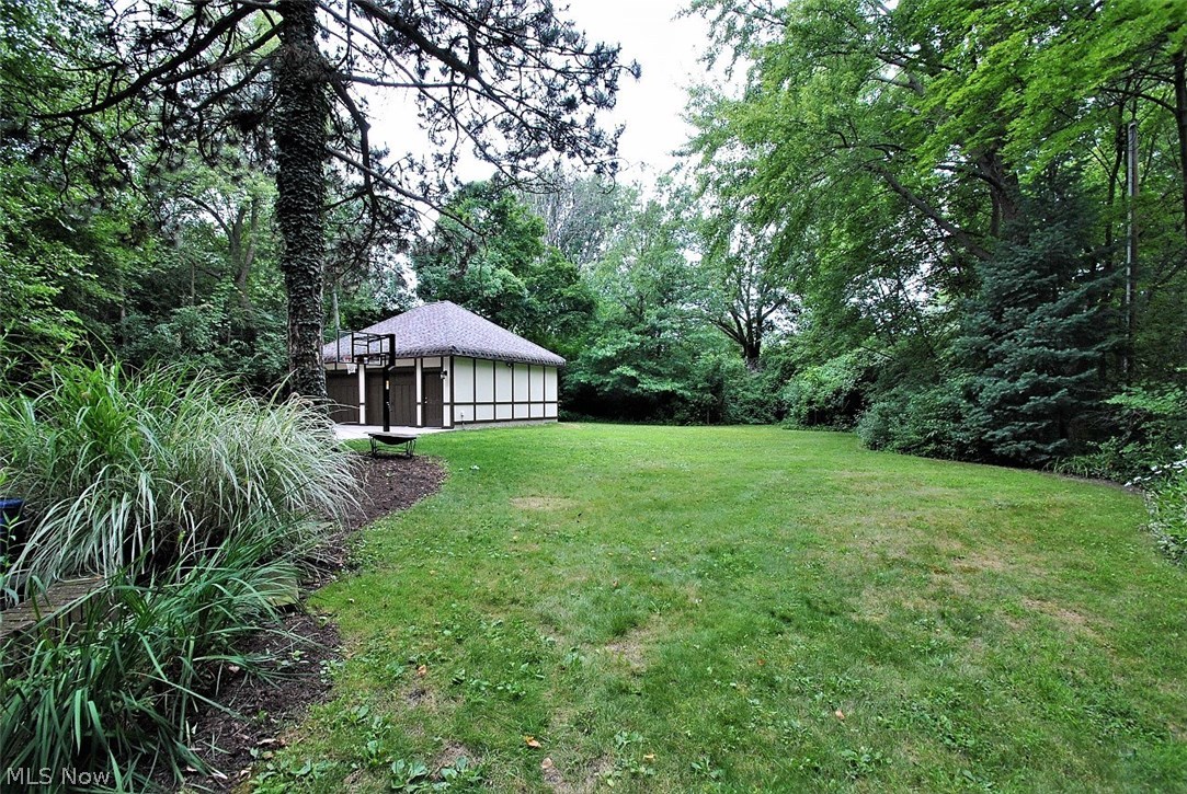 2570 Coventry Road Cleveland, OH 44120 - Photo 34 of 35 View of expansive yard surrounded by grandfather trees for shade and privacy.