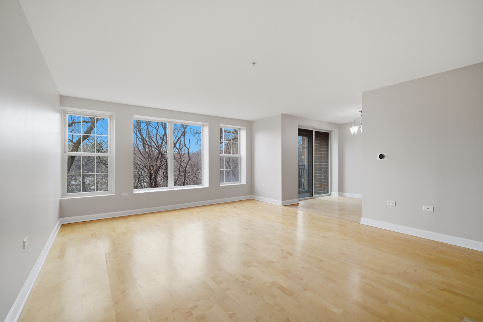 1625 Glenview Road, Unit 207 Glenview, IL 60025 - Photo 4 of 16 a view of an empty room with a window