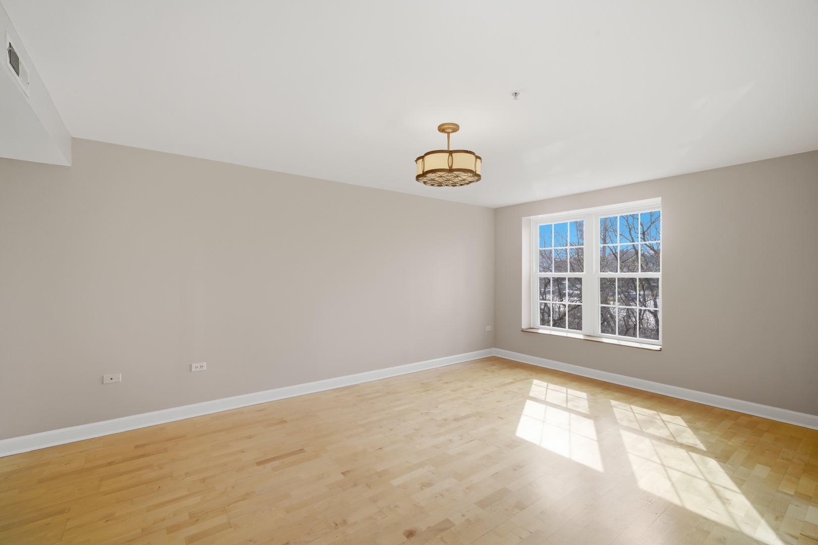 1625 Glenview Road, Unit 207 Glenview, IL 60025 - Photo 10 of 16 an empty room with windows