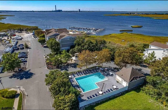 an aerial view of a house with a garden
