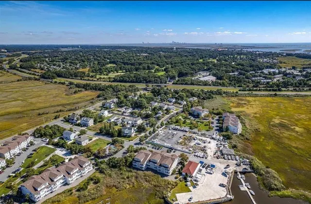 a view of a city with an ocean