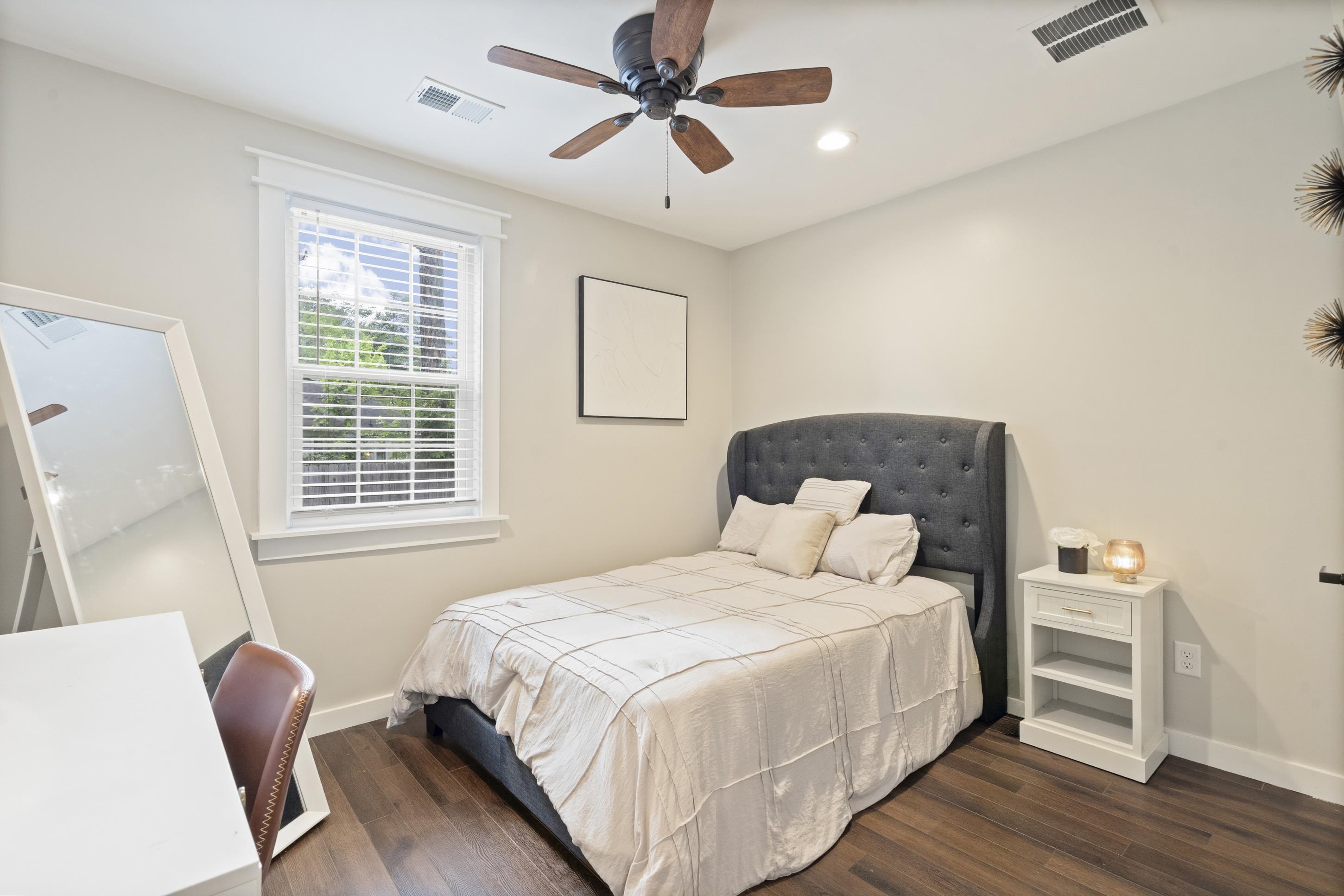 4370 Given Avenue Memphis, TN 38122 - Photo 13 of 30 Bedroom featuring wood-finish flooring, a ceiling fan with integrated lighting, a window with blinds, and light-toned walls