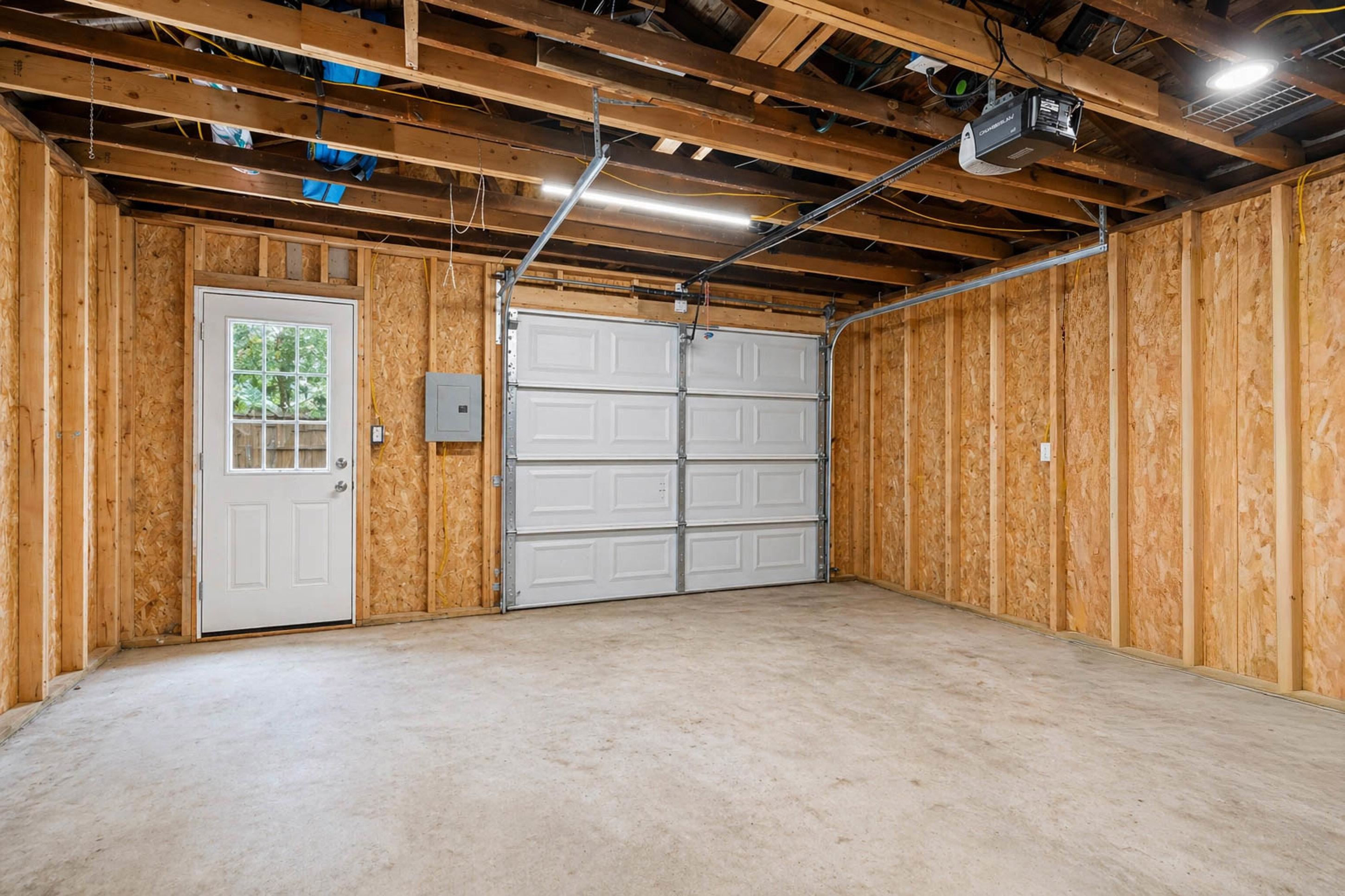 4370 Given Avenue Memphis, TN 38122 - Photo 19 of 30 Spacious garage with exposed wood framing and a concrete floor