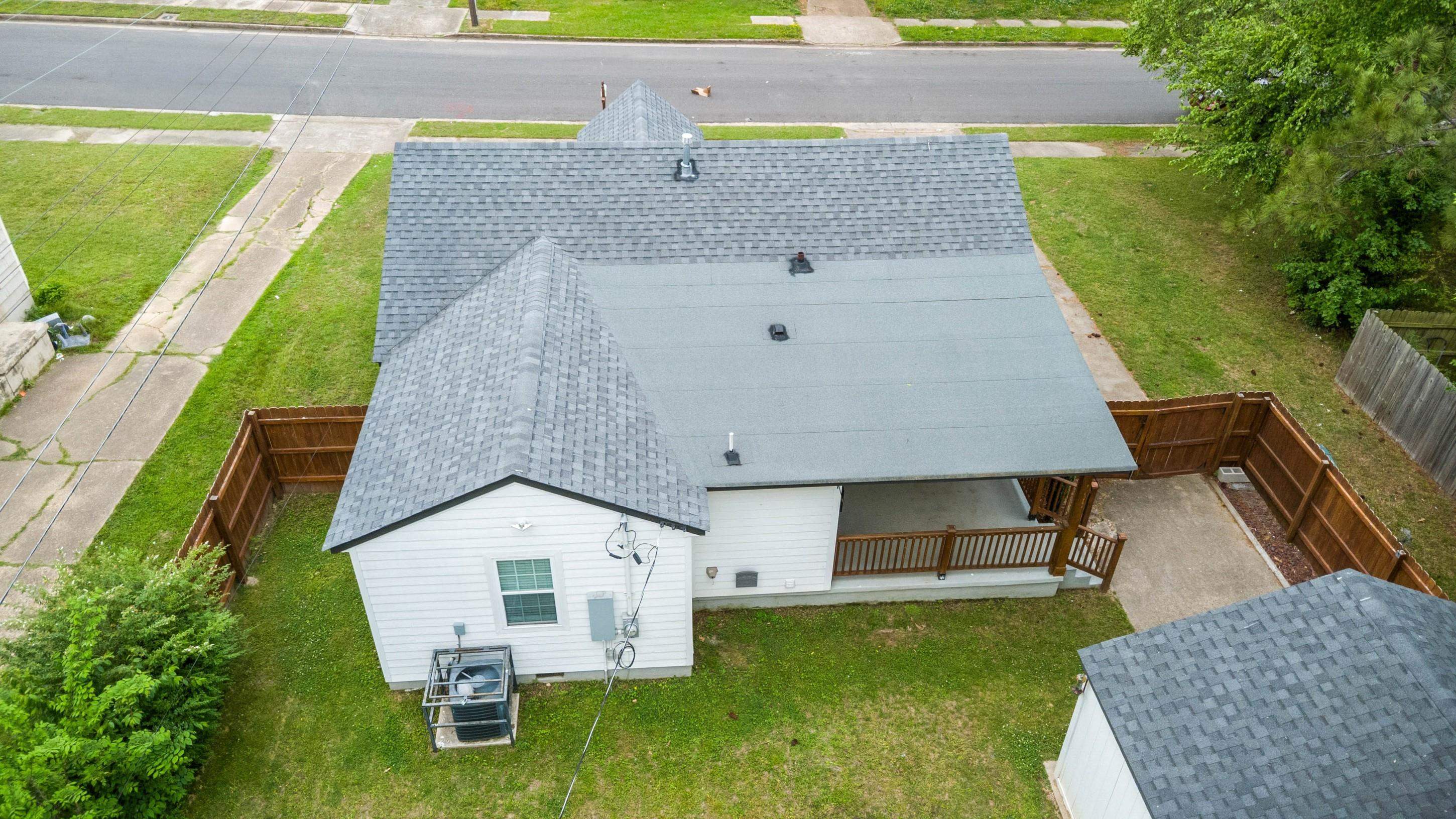 4370 Given Avenue Memphis, TN 38122 - Photo 25 of 30 Residential property featuring a grey shingle roof, white siding, and a fenced backyard