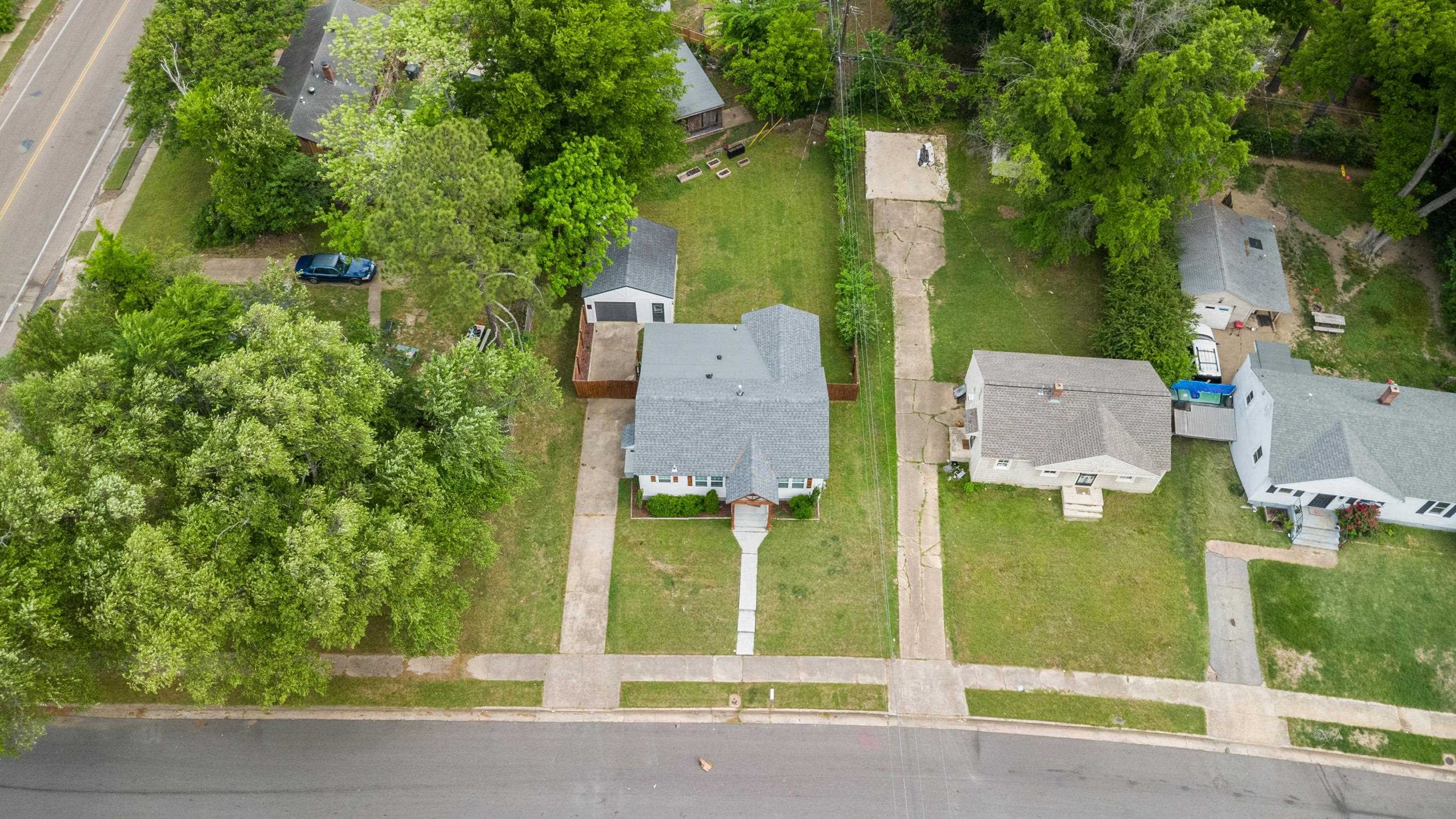 4370 Given Avenue Memphis, TN 38122 - Photo 29 of 30 Single-story residence with a gray shingle roof and light-colored siding