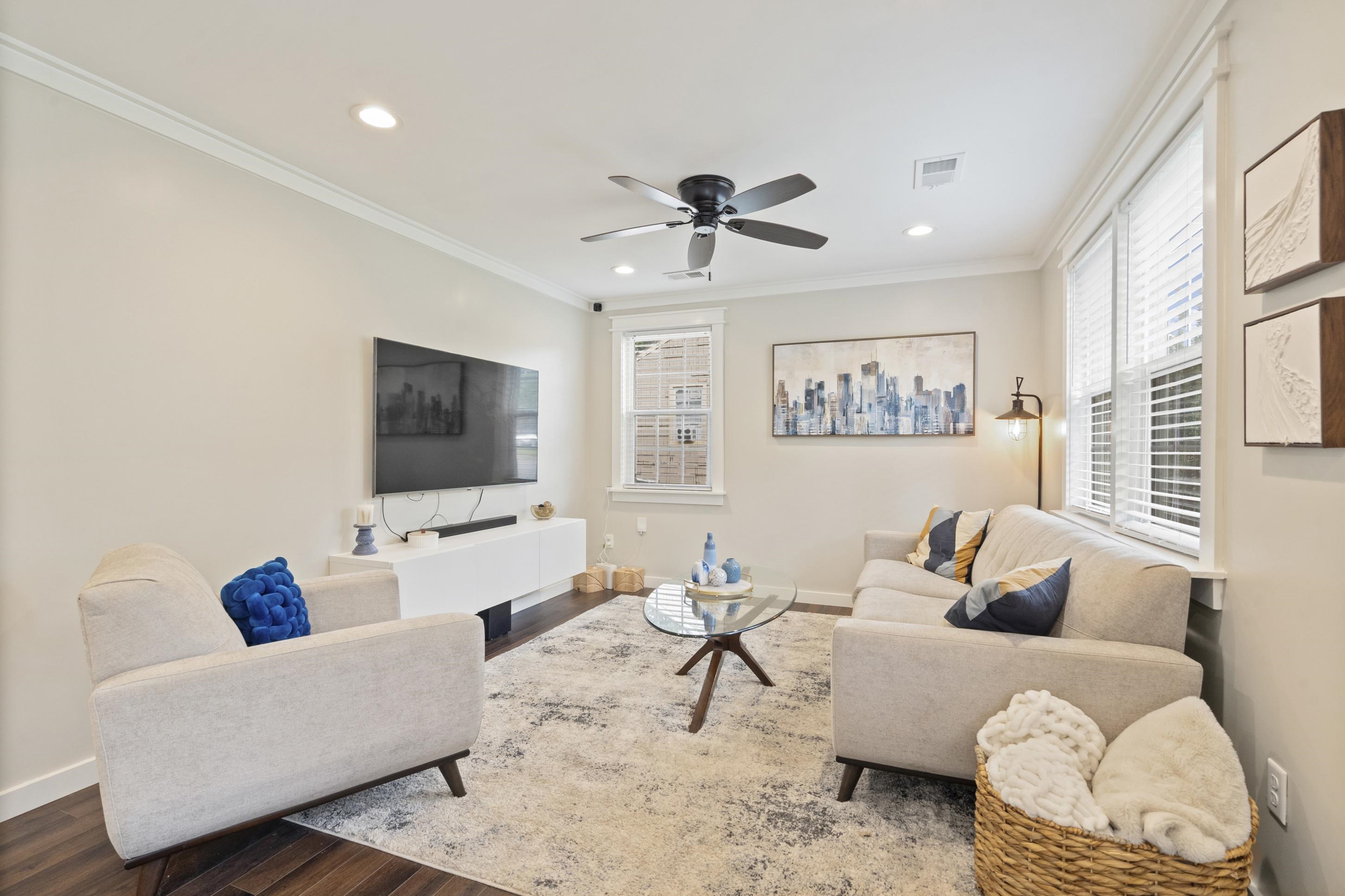 4370 Given Avenue Memphis, TN 38122 - Photo 8 of 30 Living area featuring crown molding, recessed lighting, and wood-finish flooring