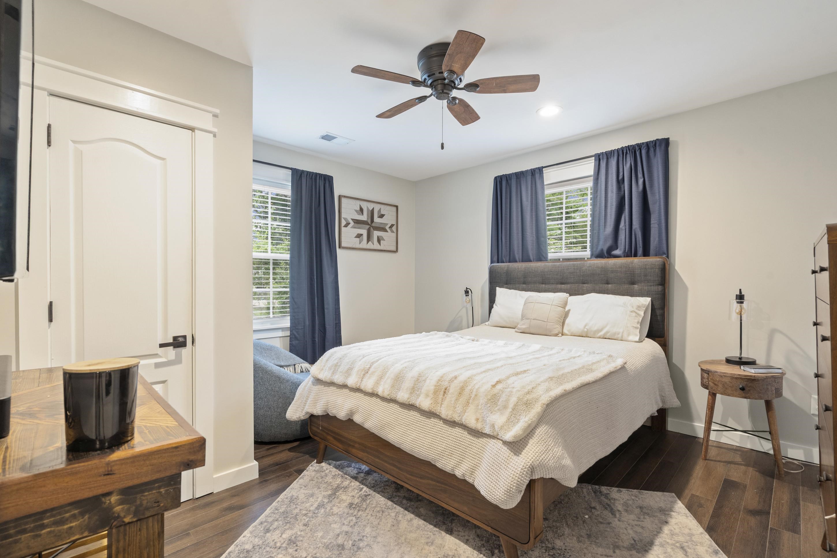 4370 Given Avenue Memphis, TN 38122 - Photo 10 of 30 Bedroom featuring wood-finish flooring, a ceiling fan with integrated lighting, recessed lighting, and a white paneled door with matte black hardware