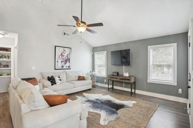 1384 Lanvale Drive Southwest Atlanta, GA 30310 - Photo 2 of 14 a living room with furniture and a flat screen tv