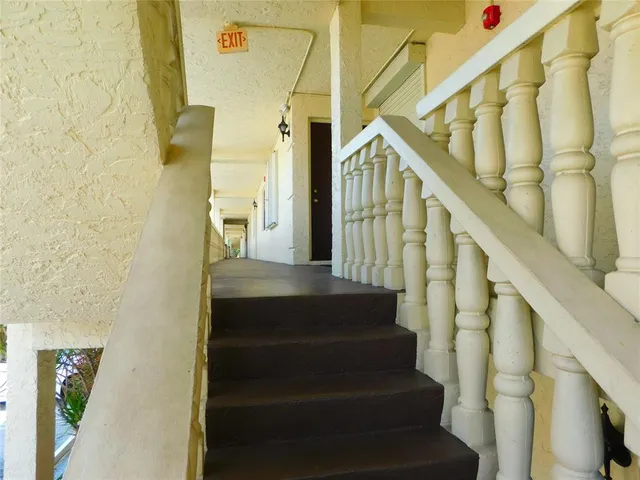 a view of a swimming pool with lounge chair