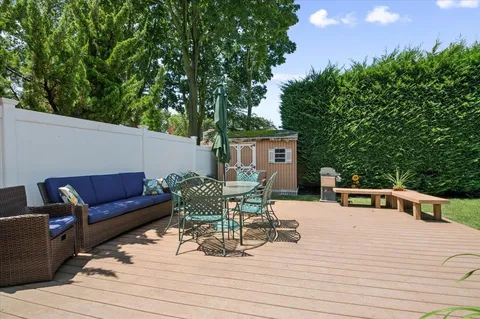 a view of a chairs and tables in the patio