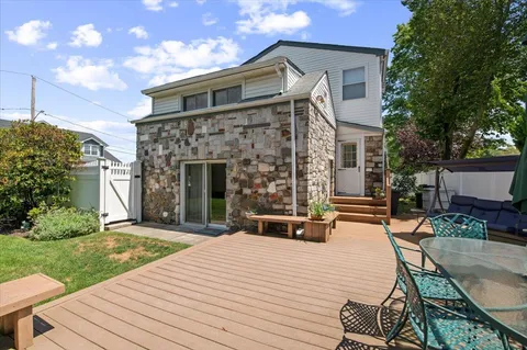 a front view of a house with patio