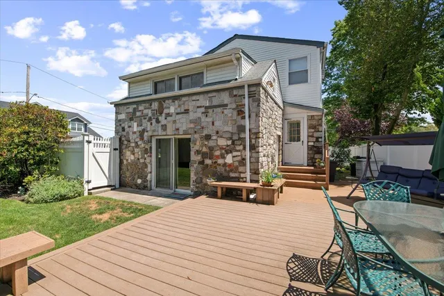 a front view of a house with patio