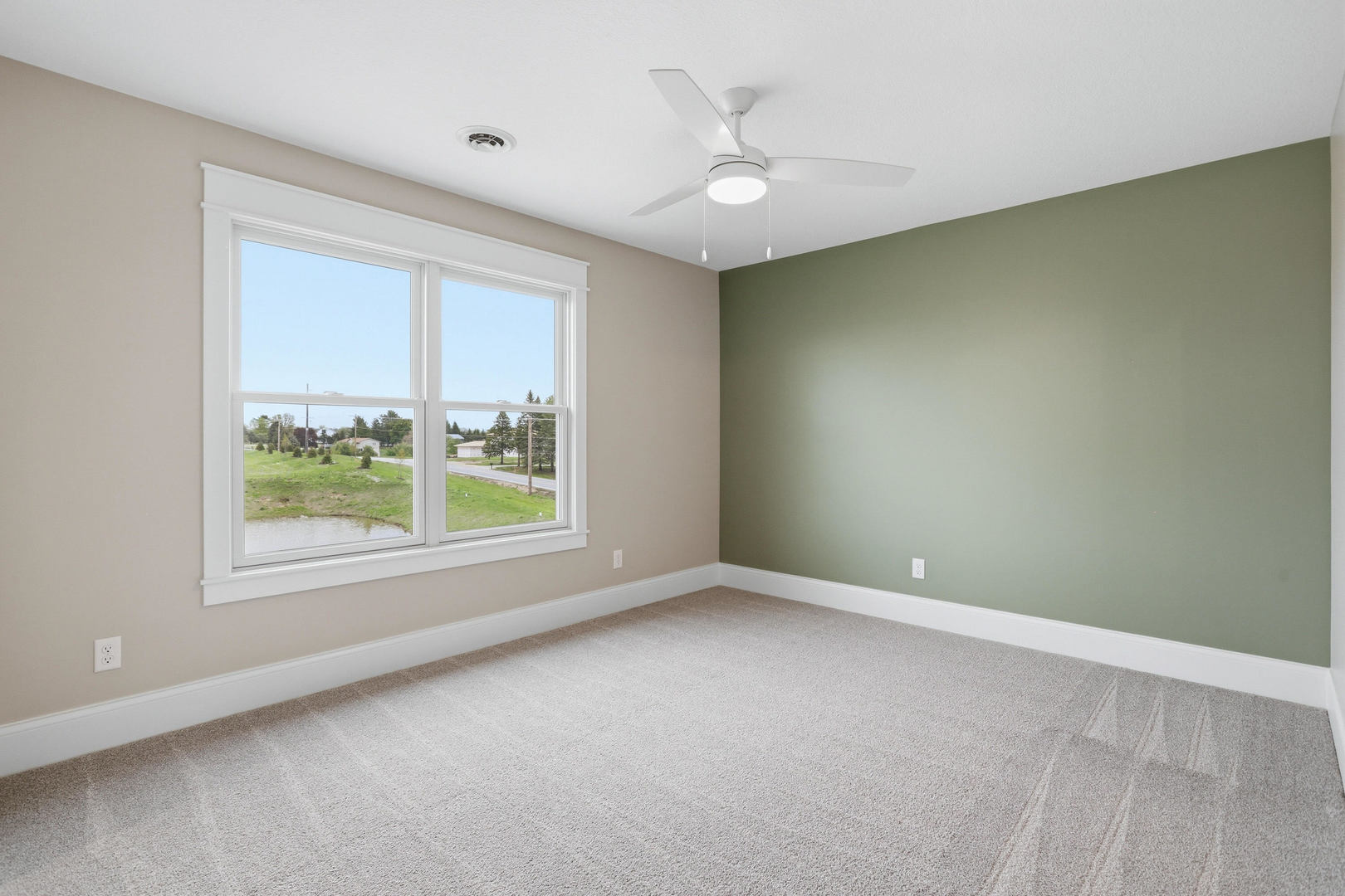 6928 Wilderness Pointe Bettendorf, IA 52722 - Photo 39 of 48 an empty room with a window