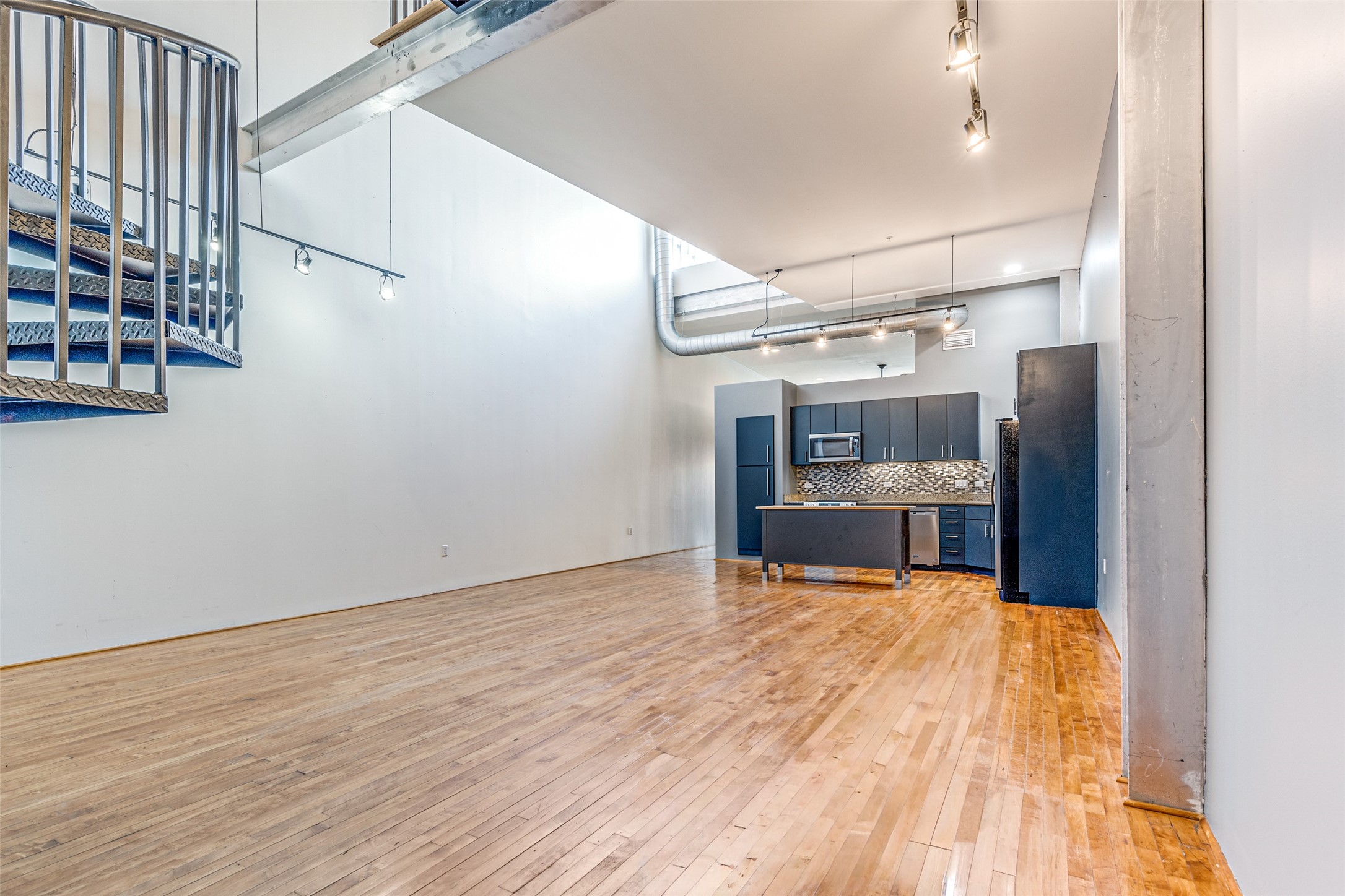 1312 Live Oak Street, Unit 223 Houston, TX 77003 - Photo 4 of 31 Alternate angle of the main living space emphasizing depth, flow, and natural light.