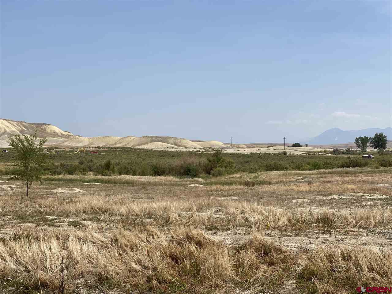 6120 Stirrup Creek Road Delta, CO 81416 - Photo 1 of 16 a view of mountain with lake view