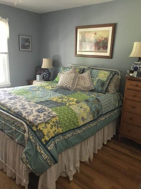351 Greensview Road Sewanee, TN 37375 - Photo 12 of 13 a bedroom with a bed and wooden floor