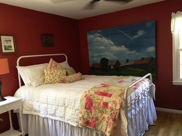 351 Greensview Road Sewanee, TN 37375 - Photo 13 of 13 a bed sitting in a bedroom next to a window