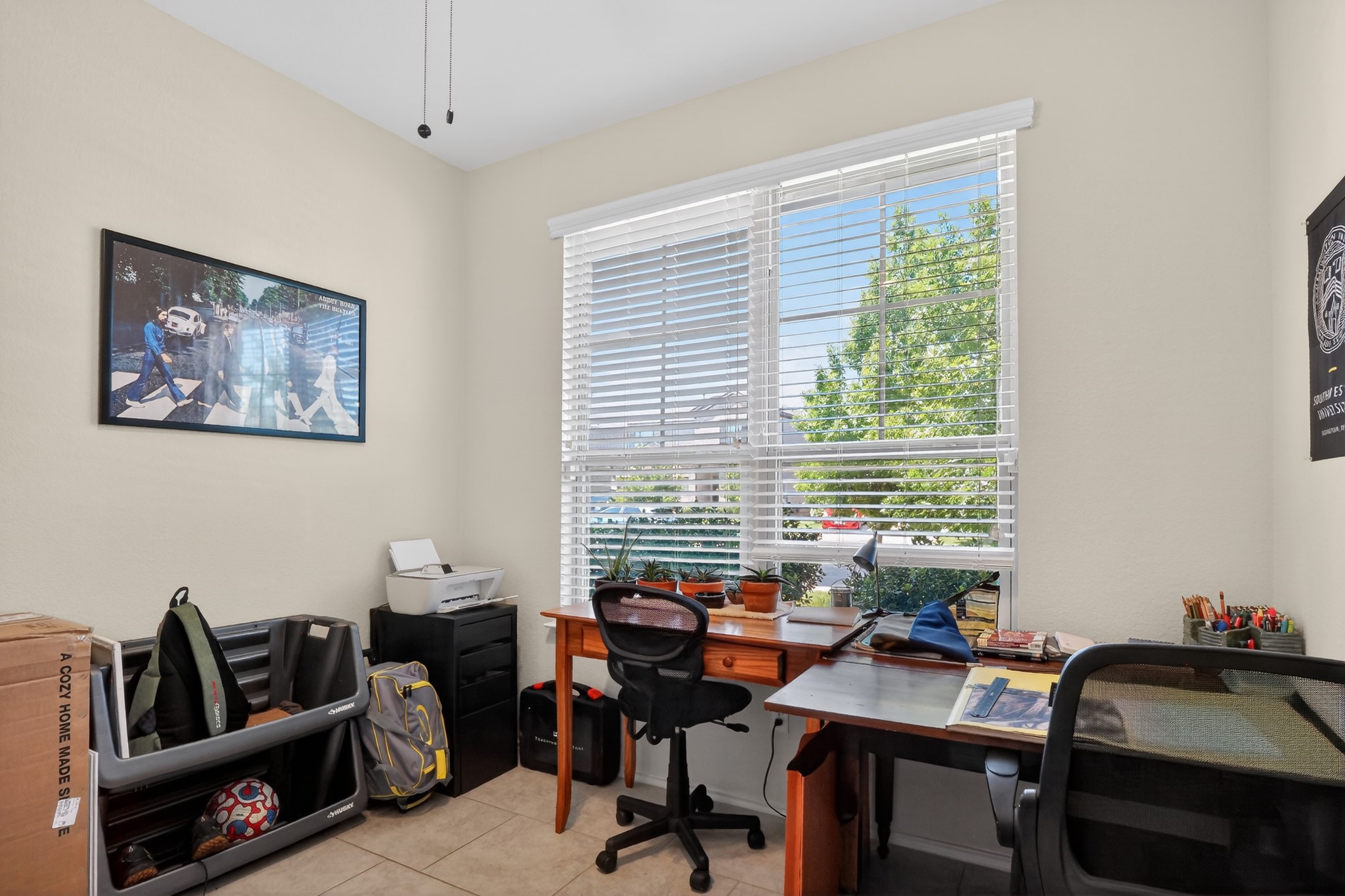 521 Staton Street Georgetown, TX 78626 - Photo 30 of 39 a view of a workspace with furniture and a window
