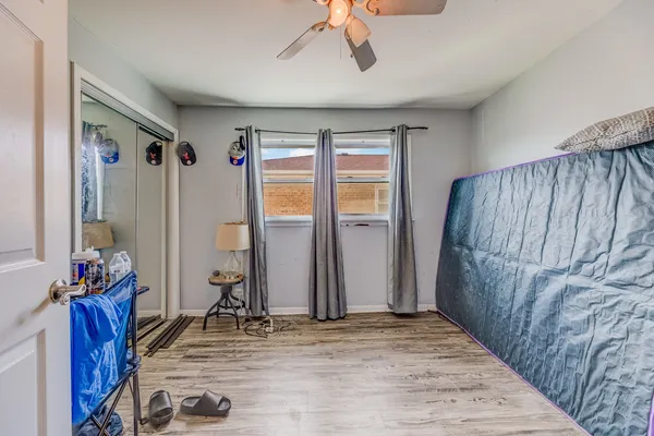 a view of a livingroom with furniture and entryway