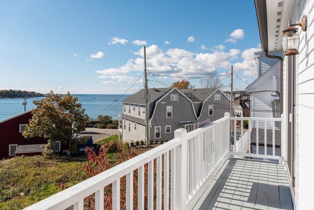 62 Eastern Point Road, Unit 3 Gloucester, MA 01930 - Photo 24 of 27 a view of a house with wooden deck