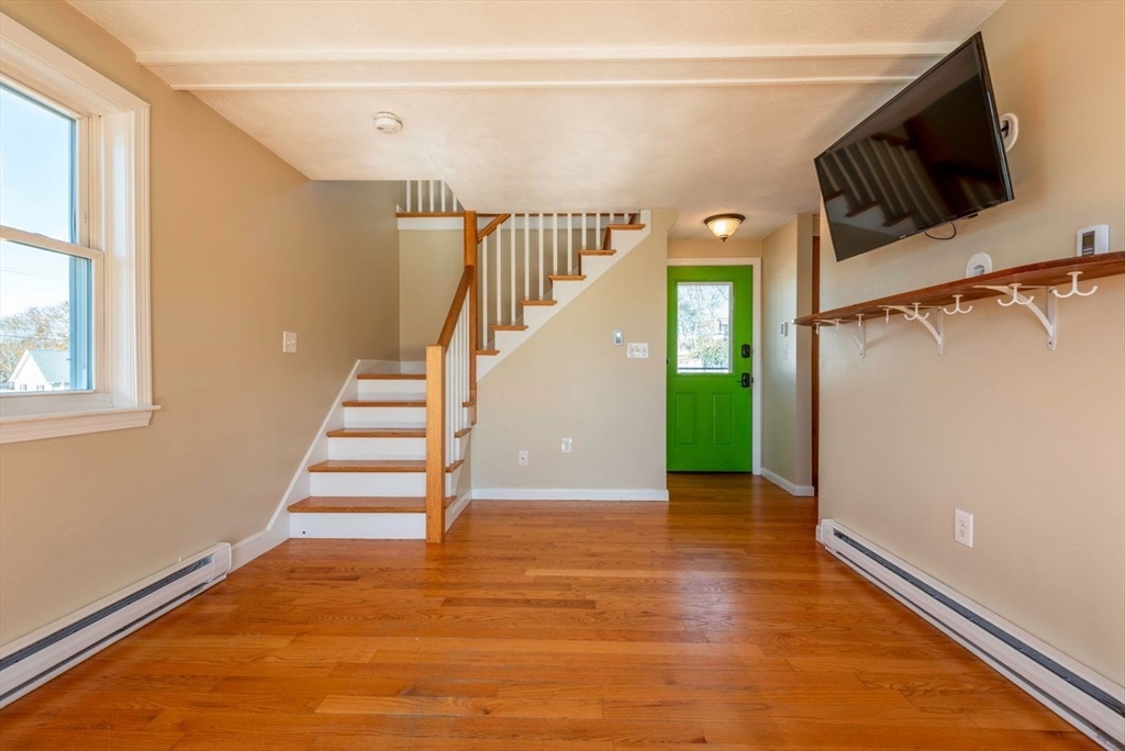 62 Eastern Point Road, Unit 3 Gloucester, MA 01930 - Photo 7 of 27 a view of entryway and hall with wooden floor