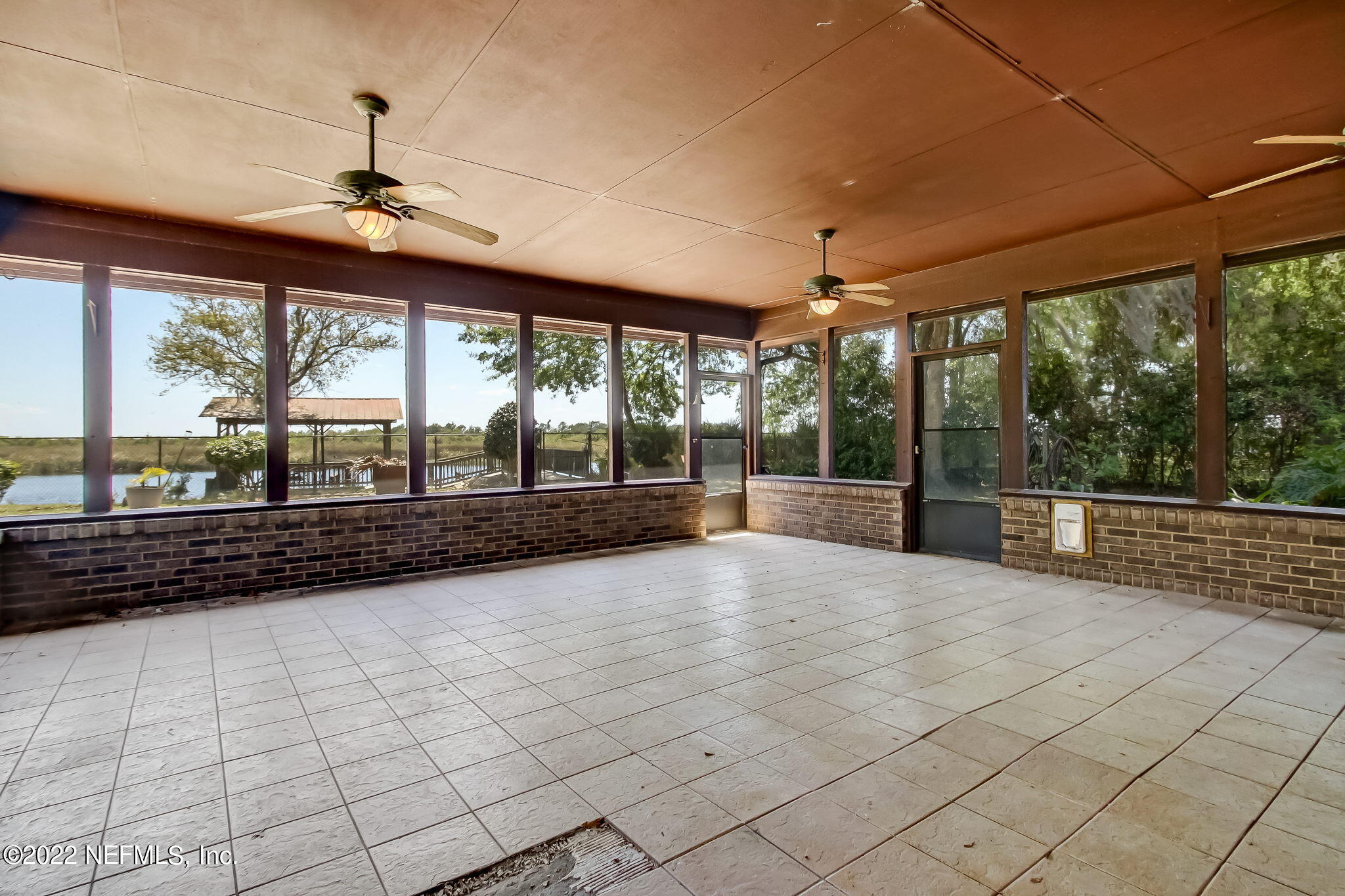 75055 Edwards Road Yulee, FL 32097 - Photo 21 of 34 a view of an empty room with a large window