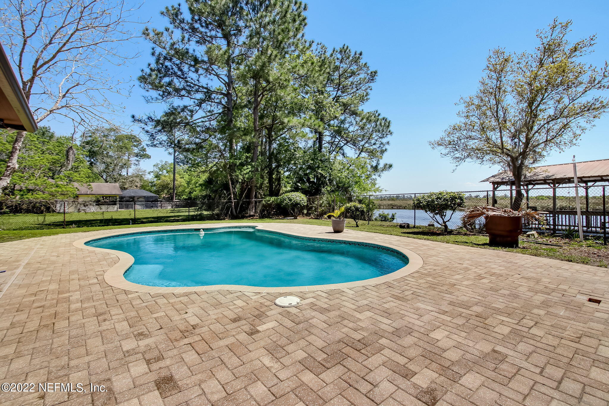 75055 Edwards Road Yulee, FL 32097 - Photo 23 of 34 a view of outdoor space yard and swimming pool