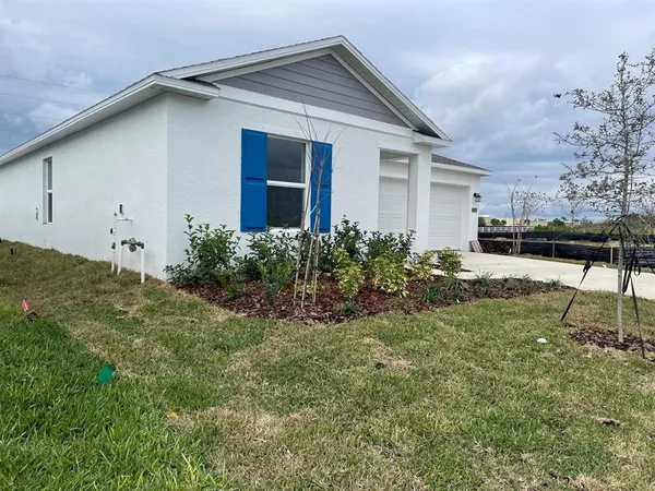 a front view of house with yard
