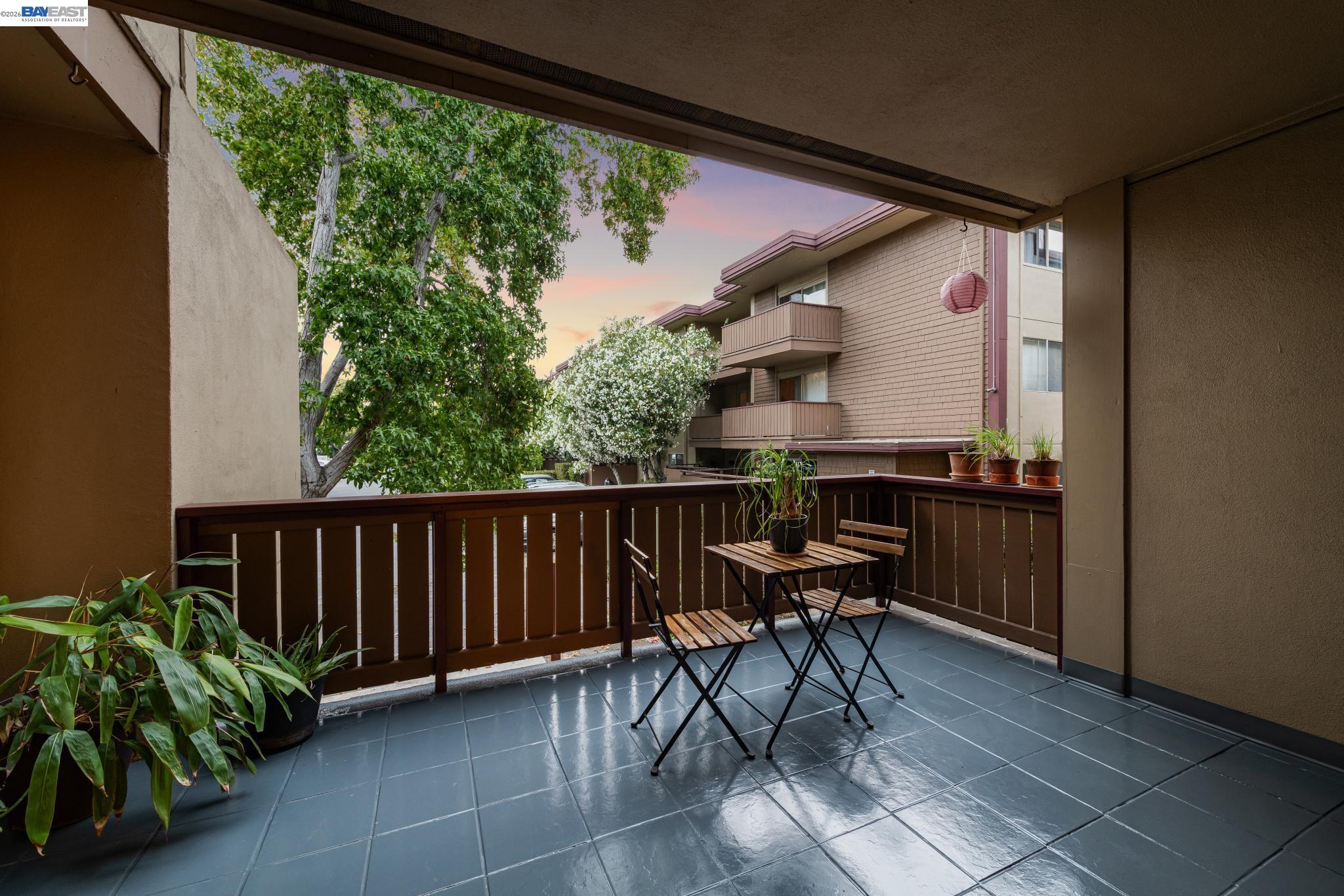 1321 Webster Street, Unit D116 Alameda, CA 94501 - Photo 9 of 22 a view of a chairs and table in the balcony