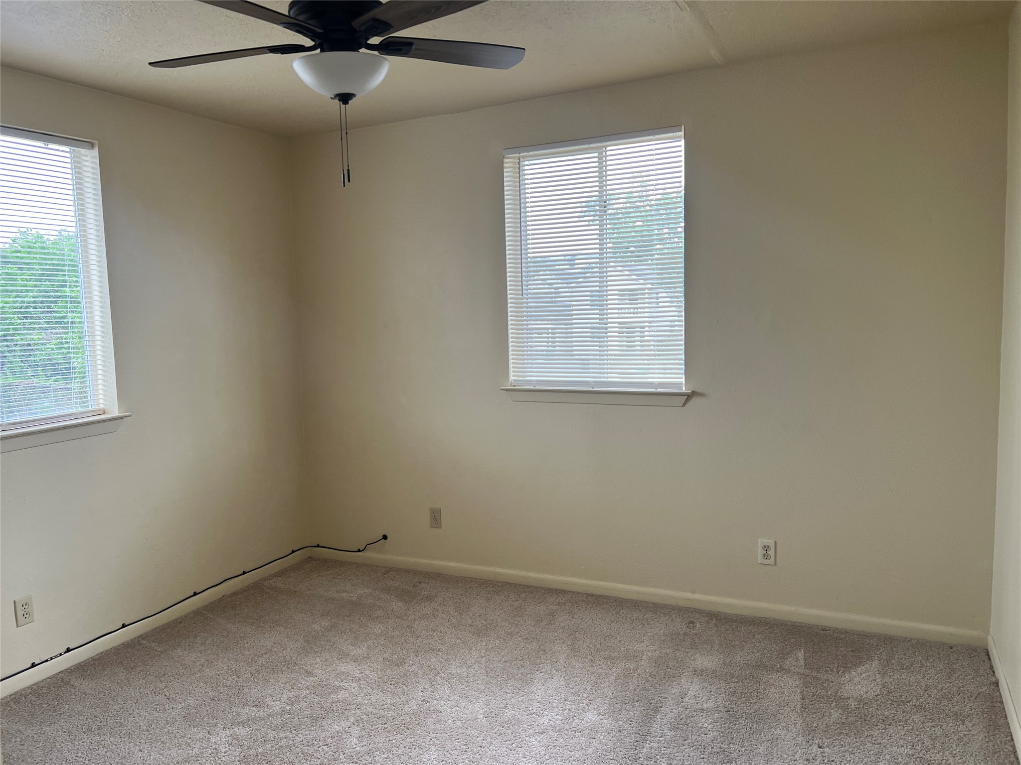 1201 Gillette Street, Unit 4 Houston, TX 77019 - Photo 9 of 12 an empty room with a window