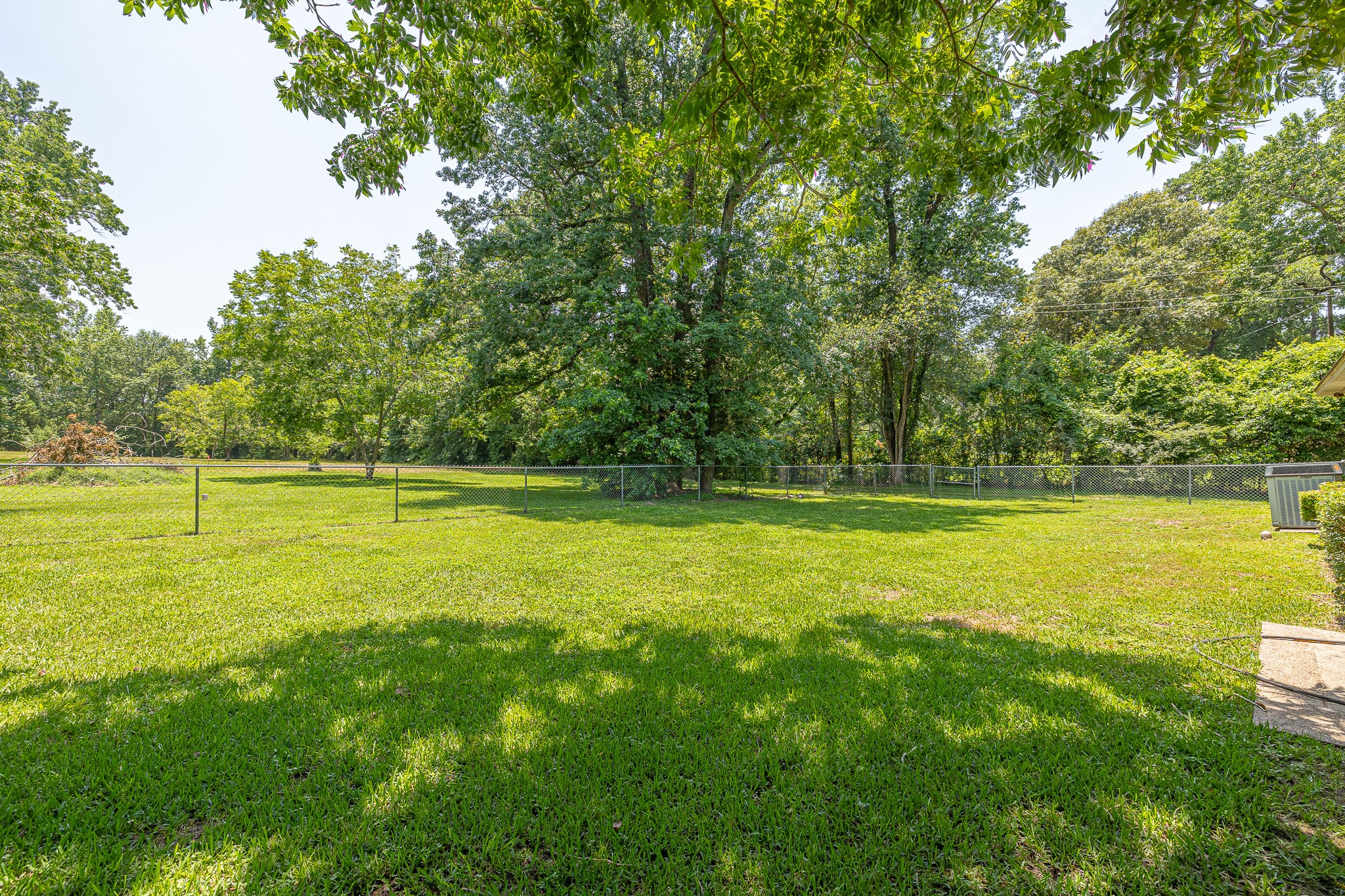 1009 Fish Hatchery Road Huntsville, TX 77320 - Photo 2 of 16 a view of a swimming pool with a yard