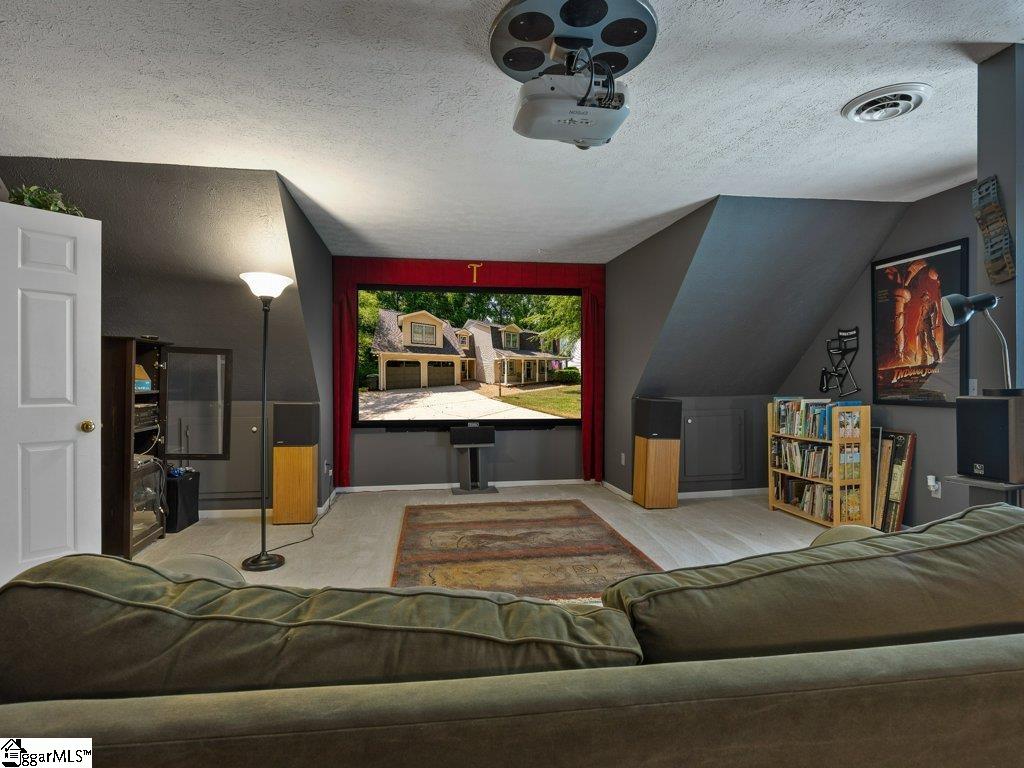 109 Crosswinds Street Greer, SC 29650 - Photo 29 of 36 Authentic stationary 100+ inch home theatre screen complete with all equipment and surround sound speakers.