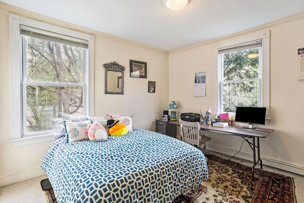 20 Gowell Lane Weston, MA 02493 - Photo 13 of 32 a bedroom with a bed and wooden floor