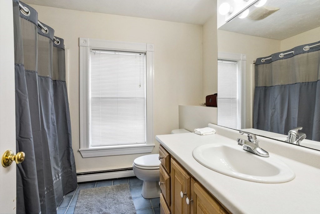 20 Gowell Lane Weston, MA 02493 - Photo 22 of 32 a bathroom with a sink toilet and shower