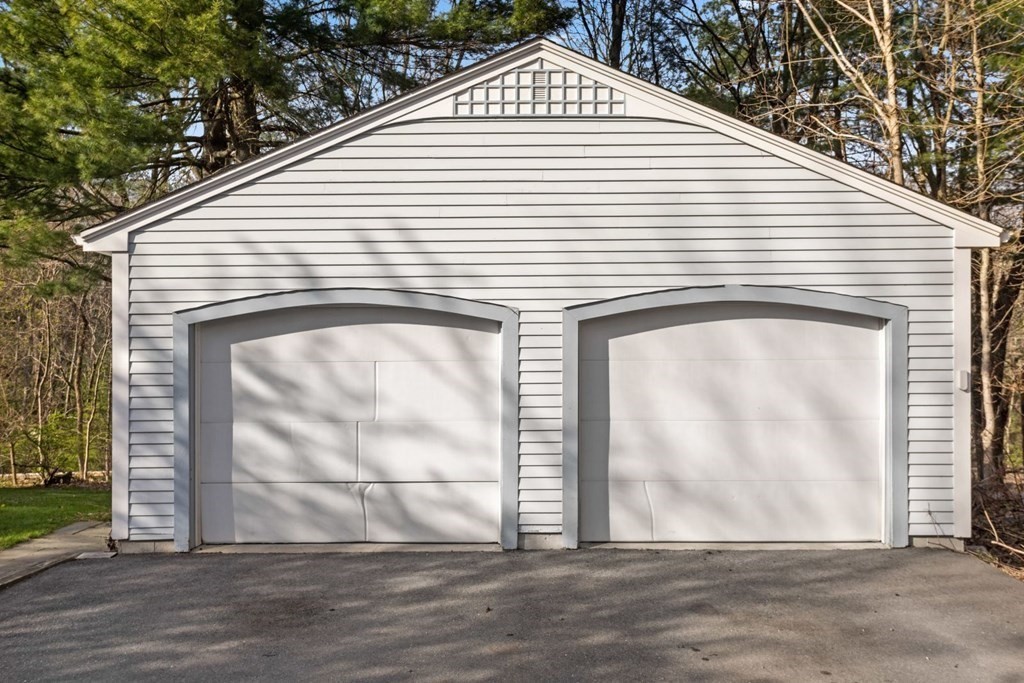20 Gowell Lane Weston, MA 02493 - Photo 30 of 32 a view of a house with a garage