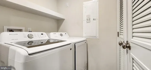 a utility room with dryer and washer