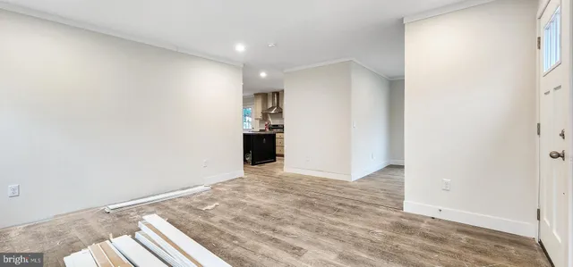 a view of an empty room and window
