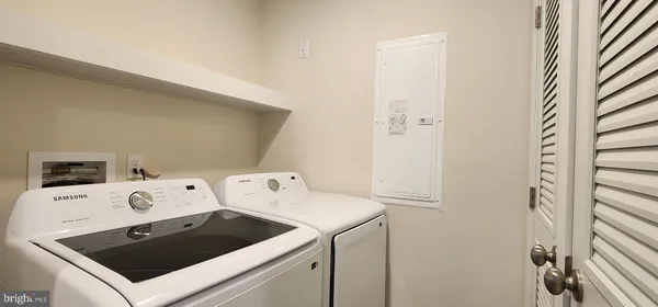 a utility room with dryer and washer