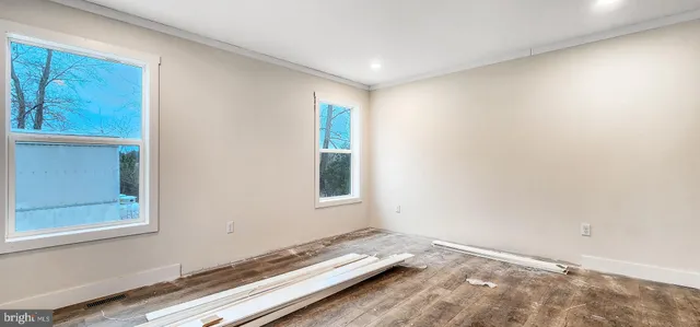 an empty room with windows