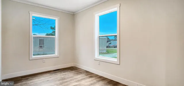 an empty room with windows